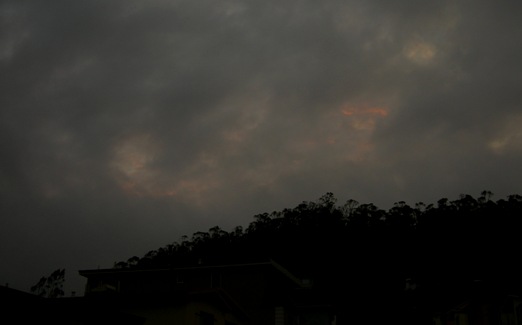 sunset through clouds